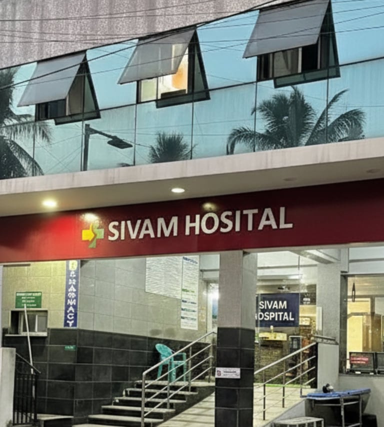 a hospital entrance with stairs and stairs leading to a hospital