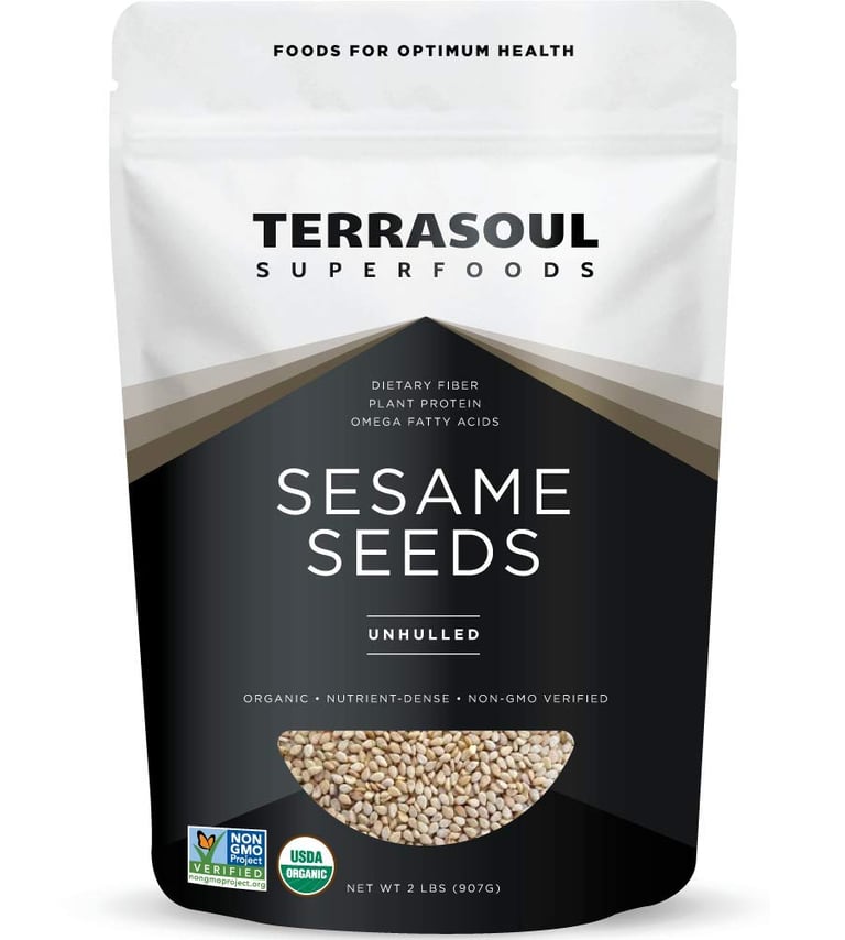 a bag of sesame seeds on a white background
