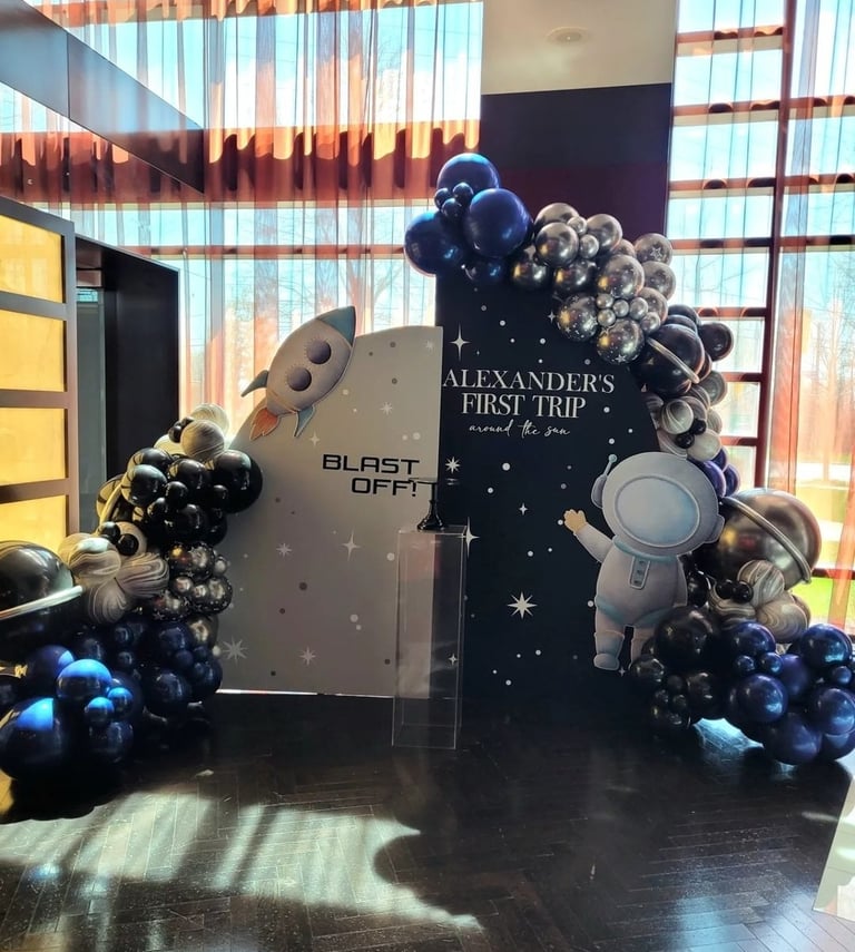 First trip Space themed balloon backdrop rental