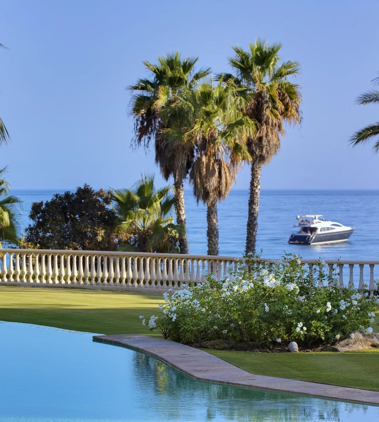 Beachfront gardens with direct views of the Mediterranean Sea
