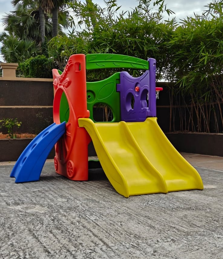 Colorful plastic toddler slide and backyard playground set for outdoor kids play.