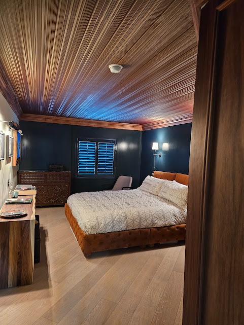 a chic hotel room with shutters el paso