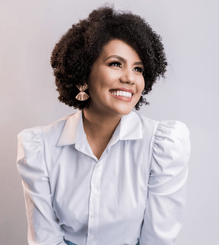 a woman with a white shirt and blue jeans
