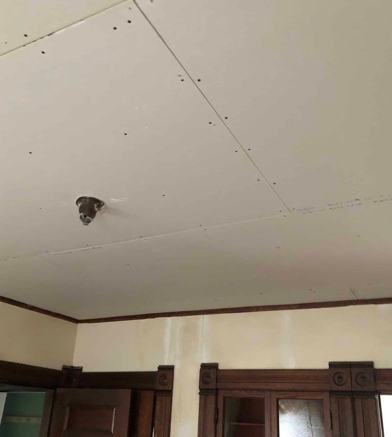 drywall ceiling with drywall just installed very nice job