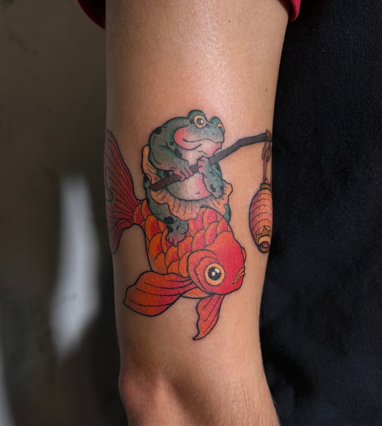 Frog riding a fish in japanese neo traditional tattoo