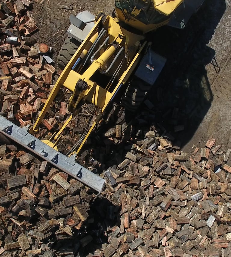 Loader bucket with firewood