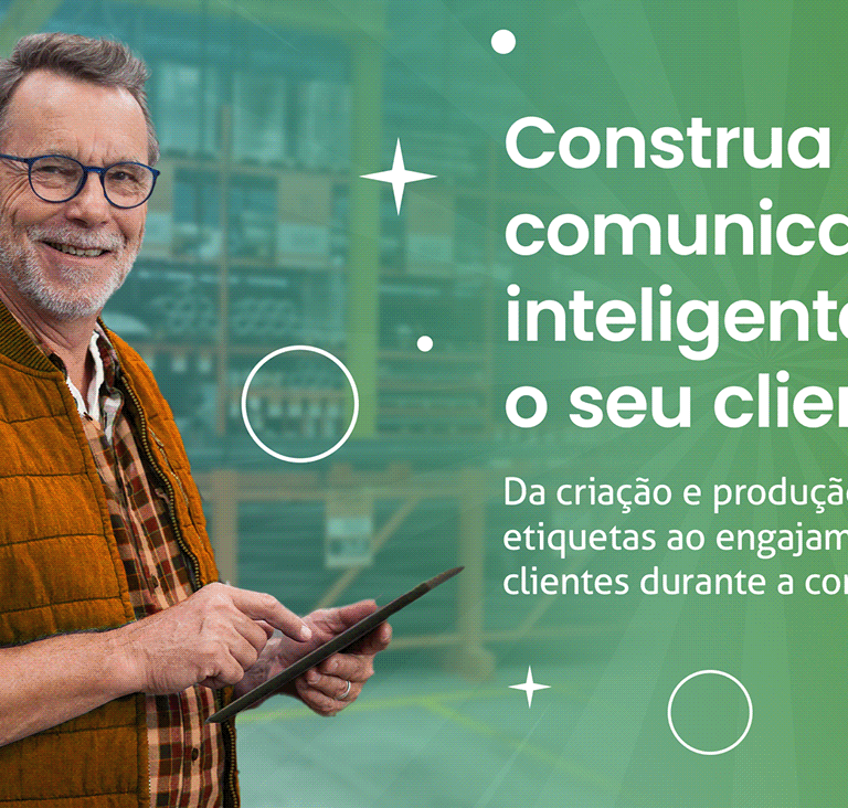 a man in a vest and glasses holding a cell phone