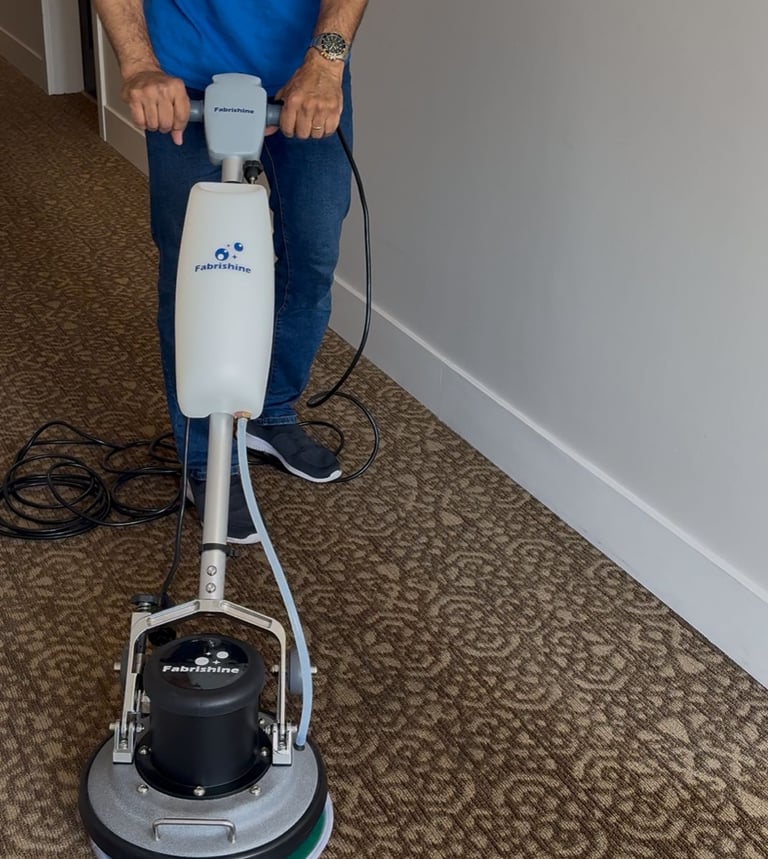 Carpet shampooing stain removal