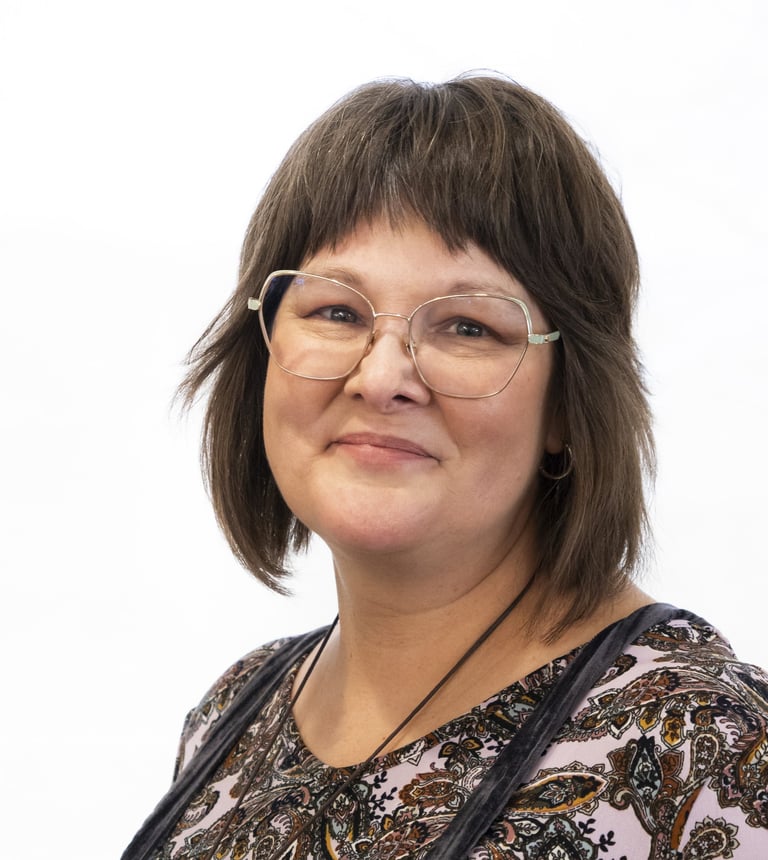 Headshot of Sheridan Garman-Neeman