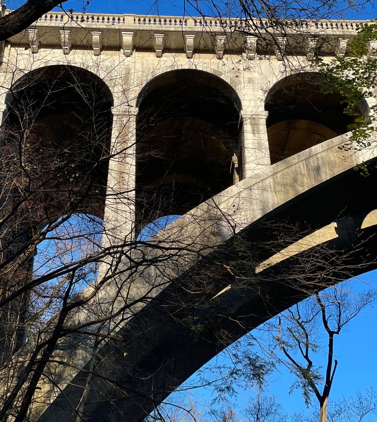 Stone bridge with blue sky in background