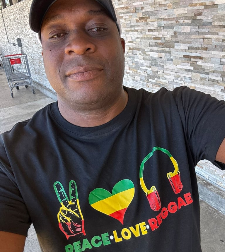a man in a black shirt and a hat