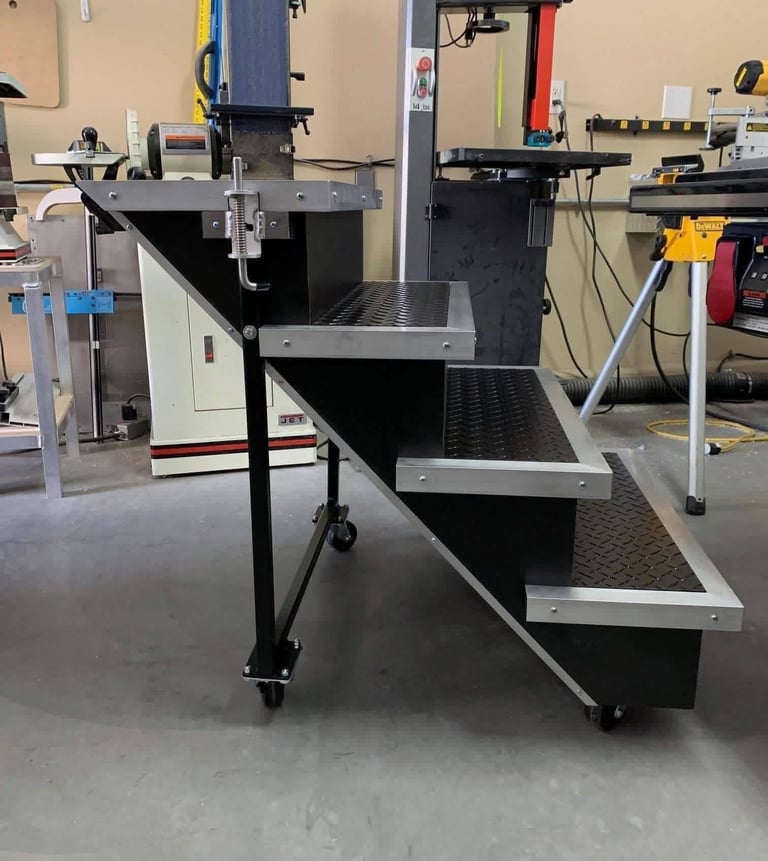 deceptive stairs with black diamond plate treads and locking casters in KMD studio.