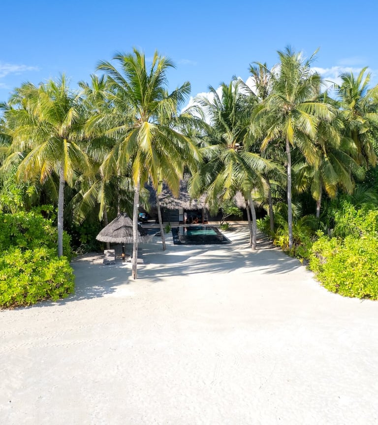 One & Only Reethi Rah Maldives beach villa arial view