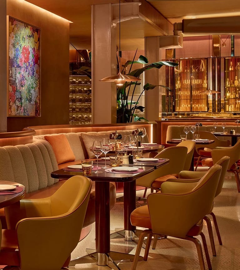 Luxurious fine dining at The Emory Hotel, featuring elegant decor and ambient lighting.