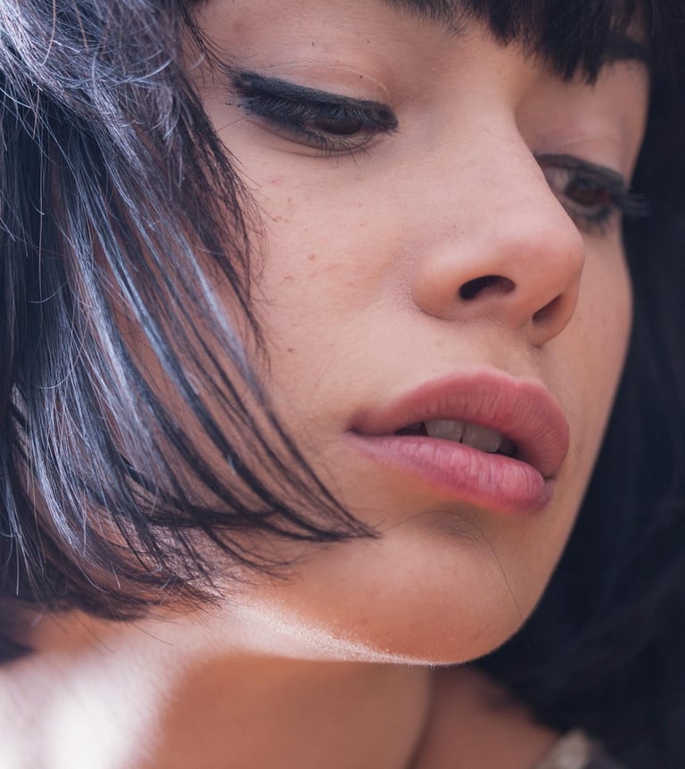 a woman with a short haircut and a short haircut