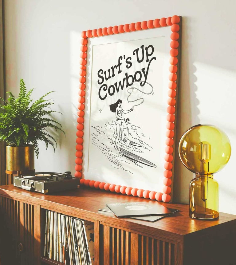 Surf's Up Cowboy vintage coastal wall art with retro surfing cowgirl illustration