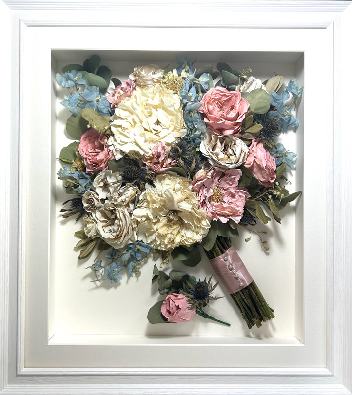 a side view preserved wedding bouquet with buttonhole