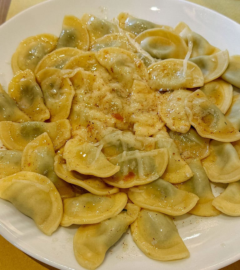 a plate of ravierottoni schlutzkrapfen