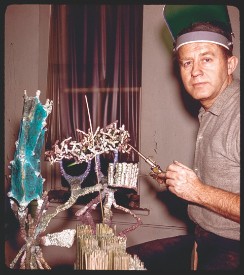 Sculptor Ibram Lassaw in 1962, working on Sui Shi, a metal sculpture.