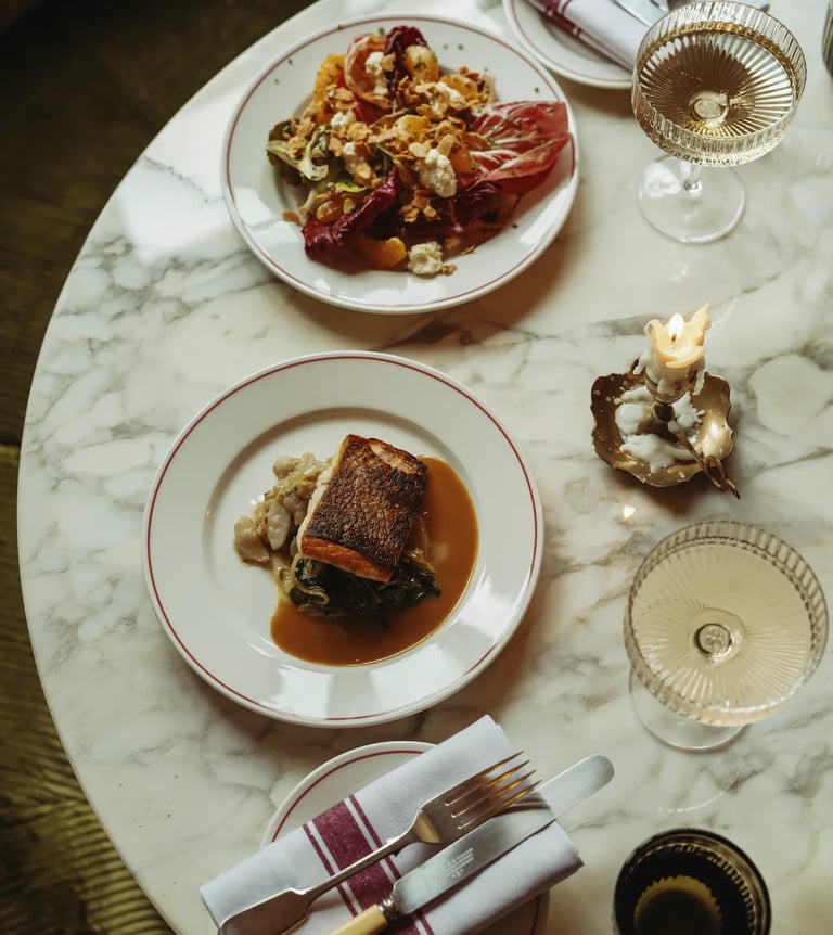 Elegant fine dining experience at Don't Tell Dad, London, featuring gourmet dishes and wine pairings