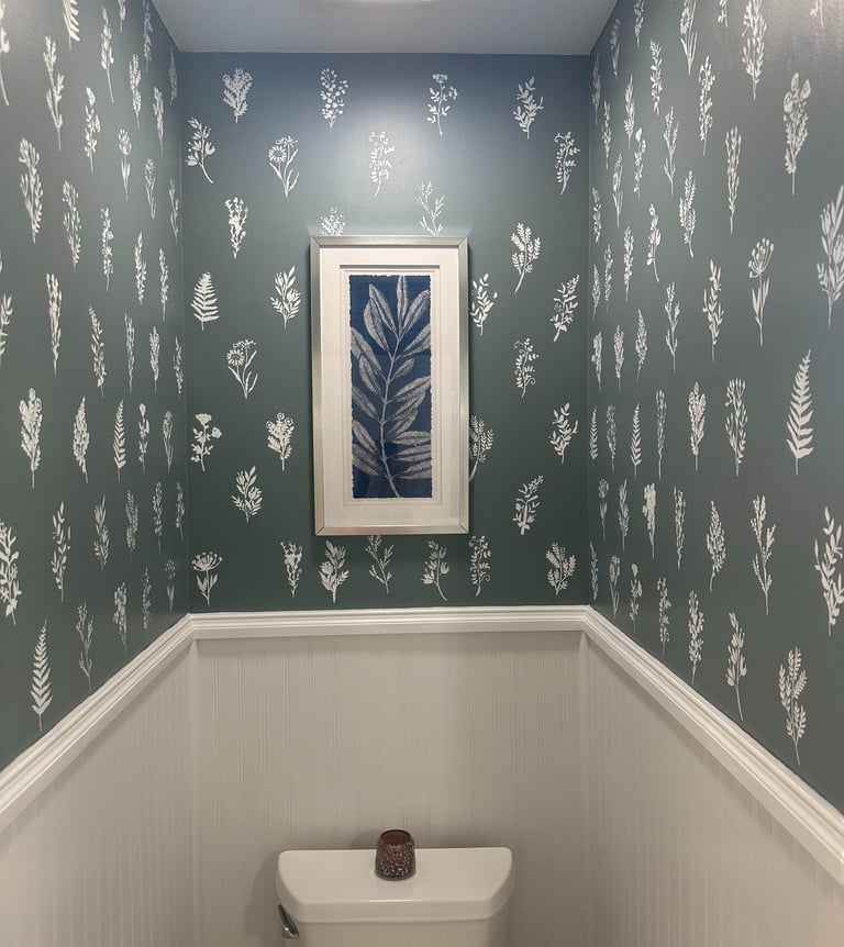 Half bath after DIY wall stenciling, budget bathroom makeover under $50