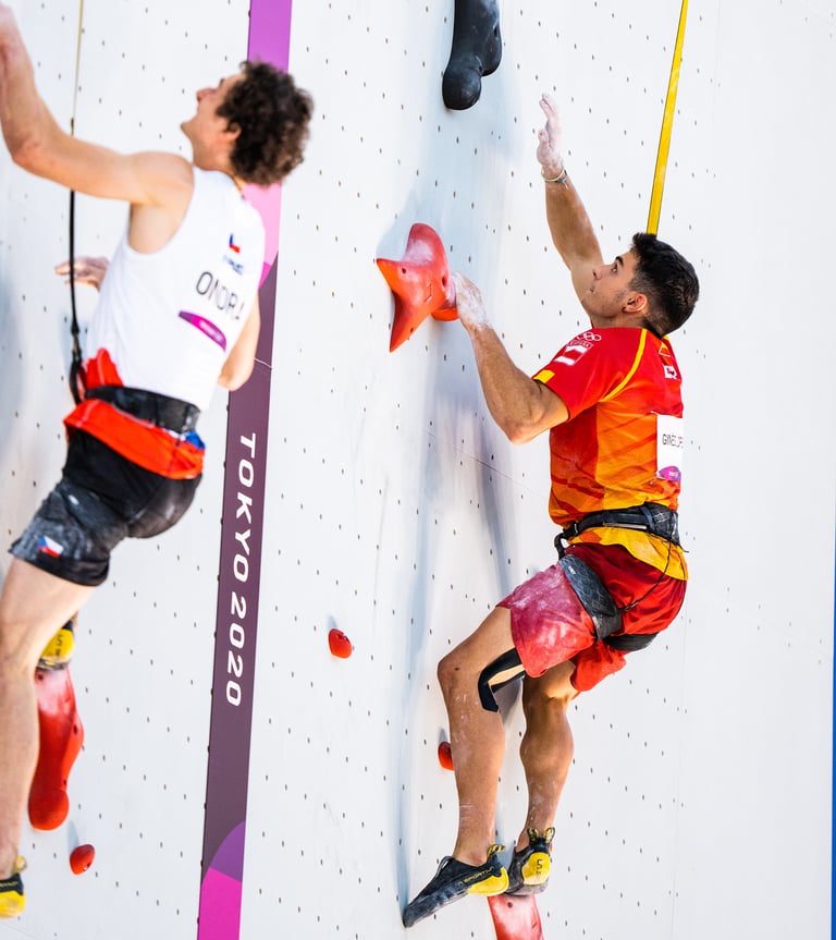 two men speed climbing in a competition