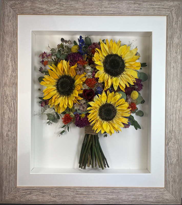 a side view preserved wedding bouquet with gorgeous sunflowers