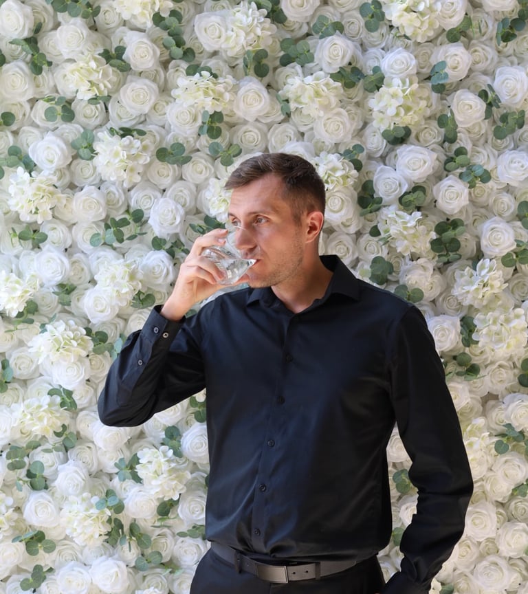 Event backdrop featuring a luxurious white rose flower wall rental in Shakopee, Minnesota