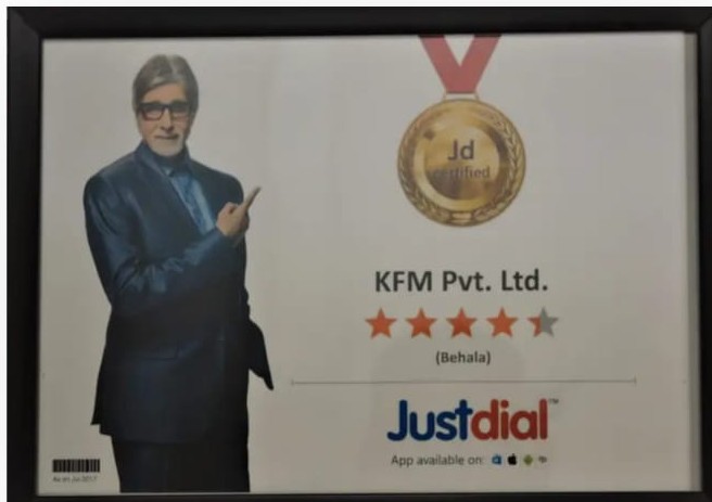 Framed Justdial JD Certified certificate for KFM Pvt Ltd featuring Amitabh Bachchan and a five star rating.
