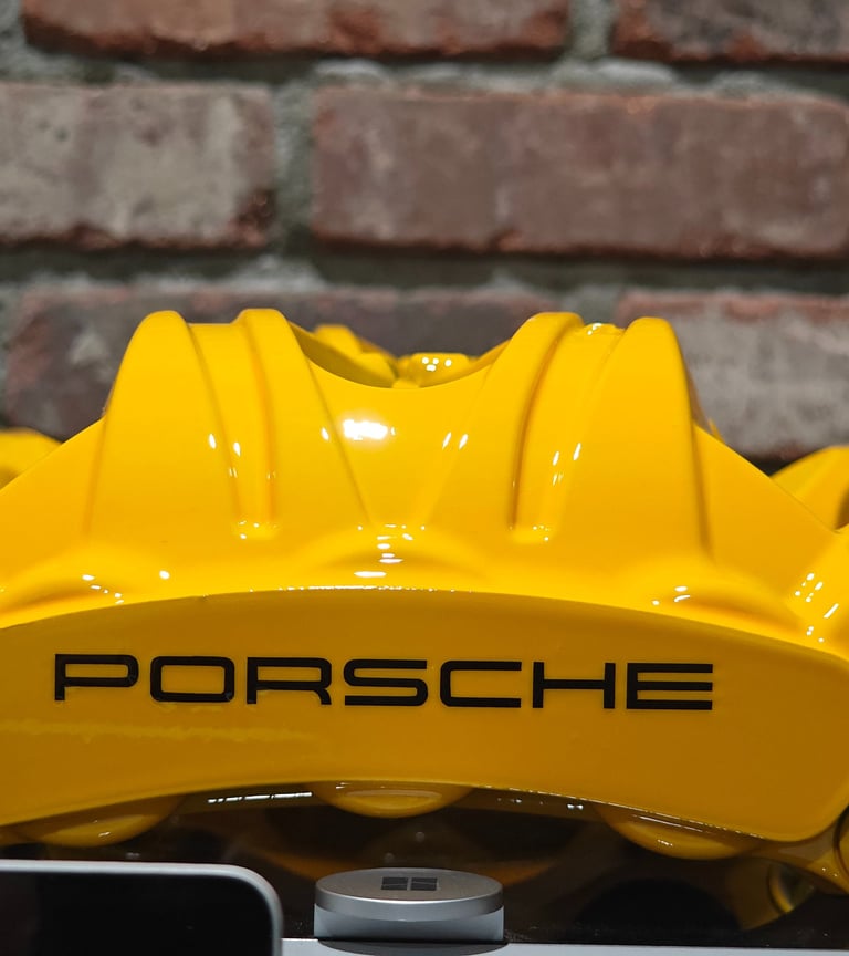 Porsche 911 GT3 calipers restored using Signal Yellow
