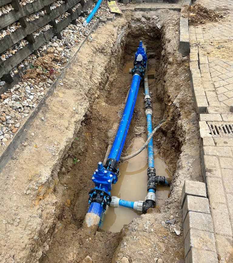 Fixing a water leak with a new pipe 