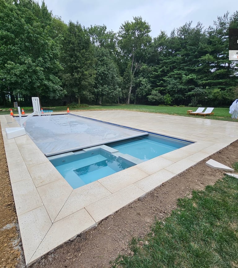 Kingdom Landscape offers custom pool landscaping, concrete pours, and custom paver patios