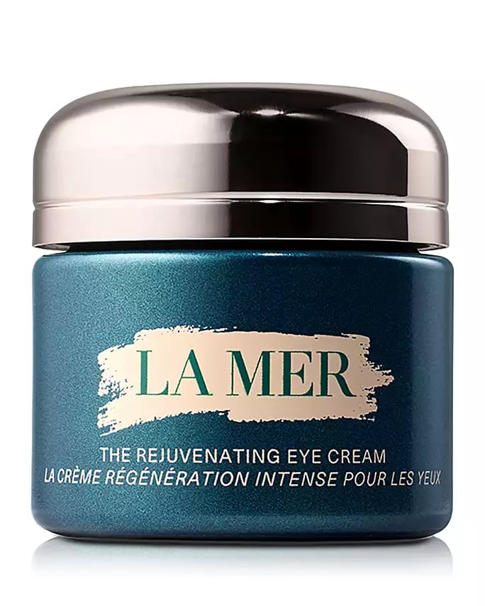 La Mer The Rejuvenating Eye Cream in a luxurious dark green jar with a metallic silver lid.