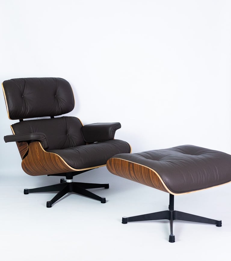 Black leather Eames lounge chair with ottoman – iconic designer chair