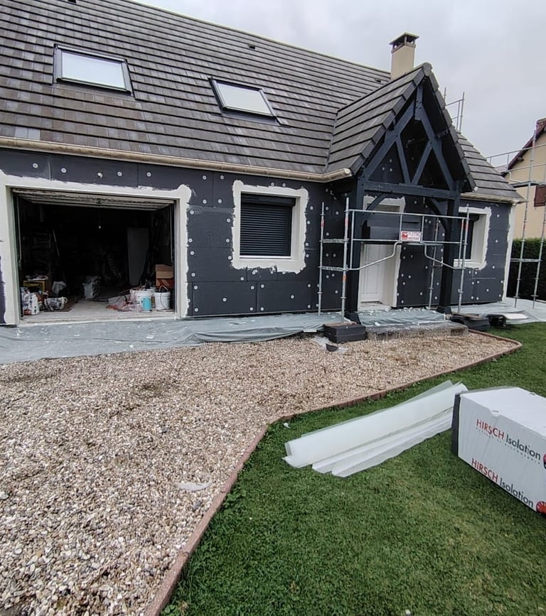 a house with a garage door and a garage door
