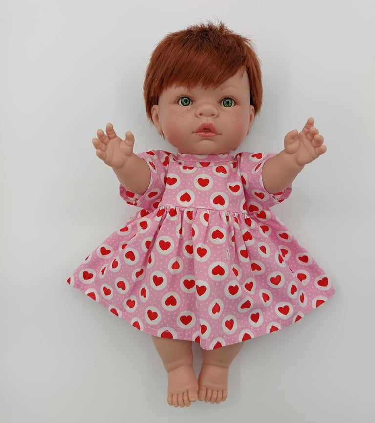 Lille Love doll dressed in pink heart dress made for Minikane doll