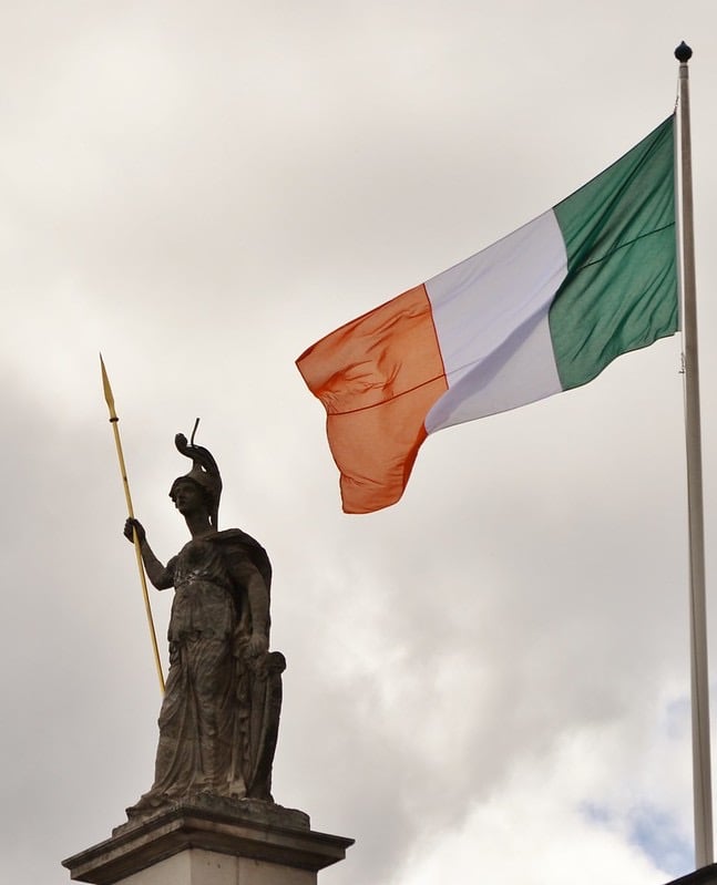 Statue of Hibernia at the GPO with the national flag beside it