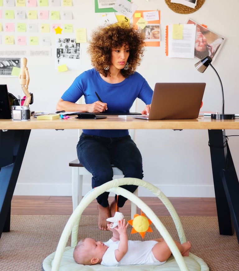 Affordable website design for moms working from home on a laptop