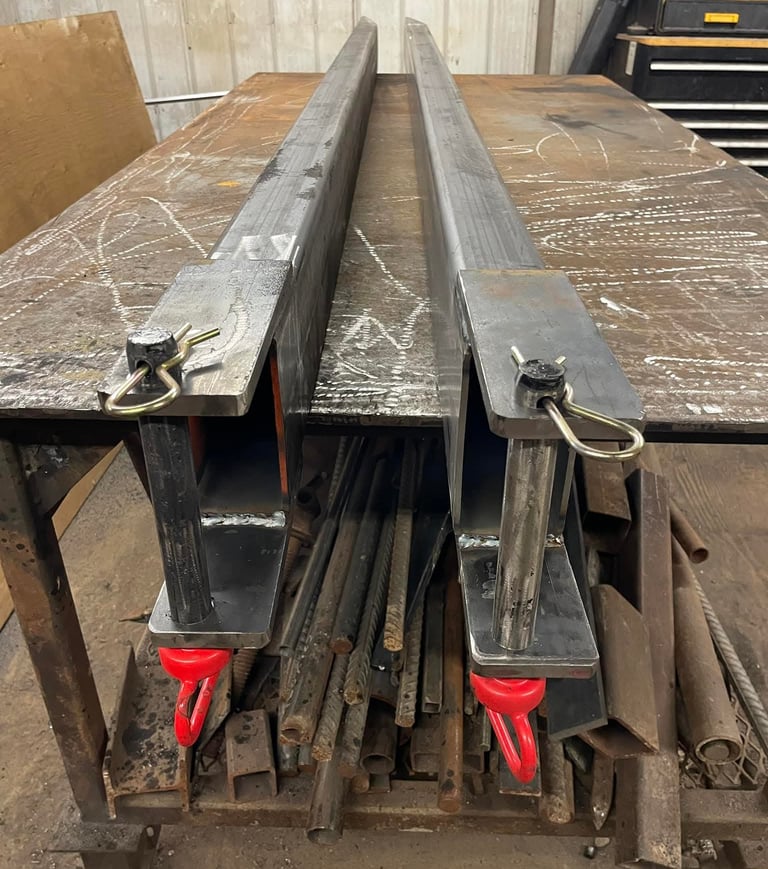 fork lift fork extensions showing safety pins lock