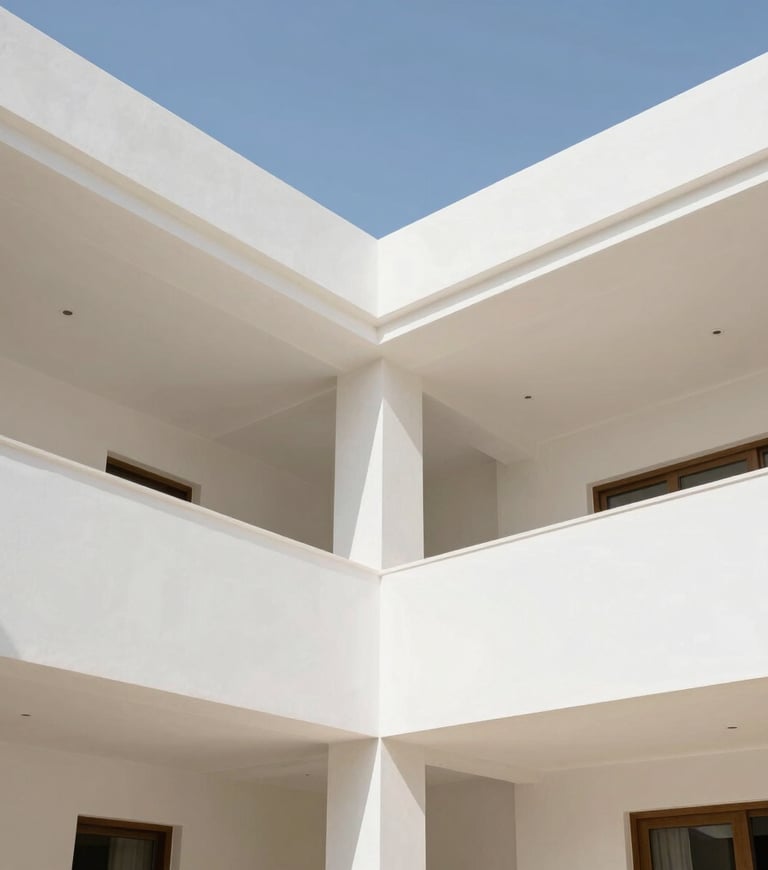Wide-angle architectural photograph of a luxury villa interior at Damac Lagoons, showcasing crisp gypsum ceiling joints and smooth white painted walls under bright natural daylight, 35mm