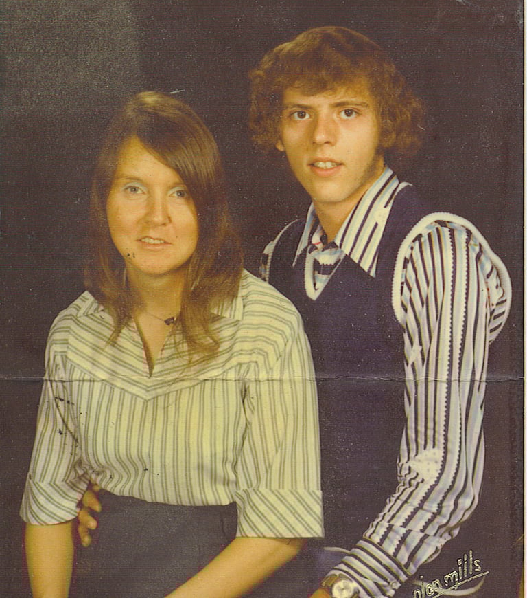 a man and woman posing for a picture
