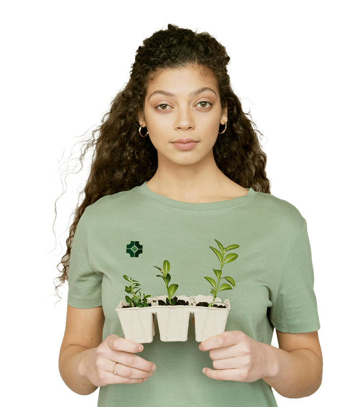 Hands holding organic compost in garden