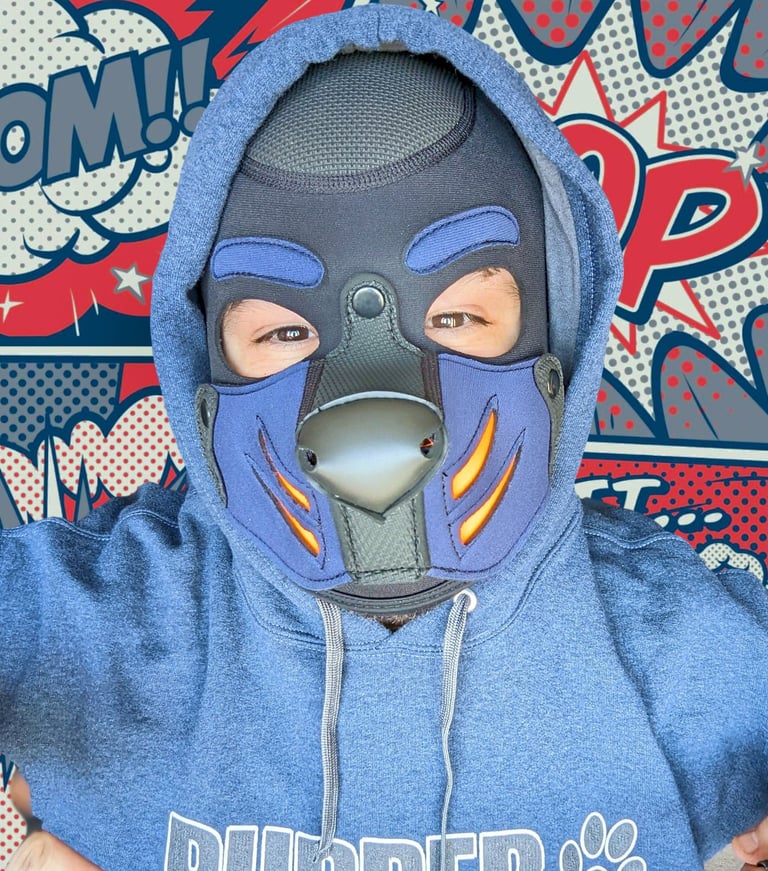 Man in a pup mask with a comic book background.