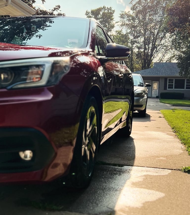 Professional mobile car wash removing grime and restoring a car’s shine
