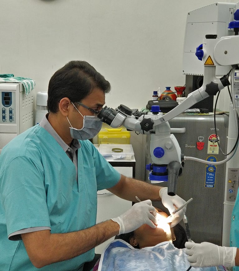 Best Endodontist doing advanced microscope assisted Root Canal Treatment at Speciality Dental Clinic in Mumbai.