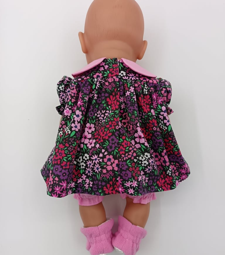 Baby Born in pink floral dress with matching pink bloomers