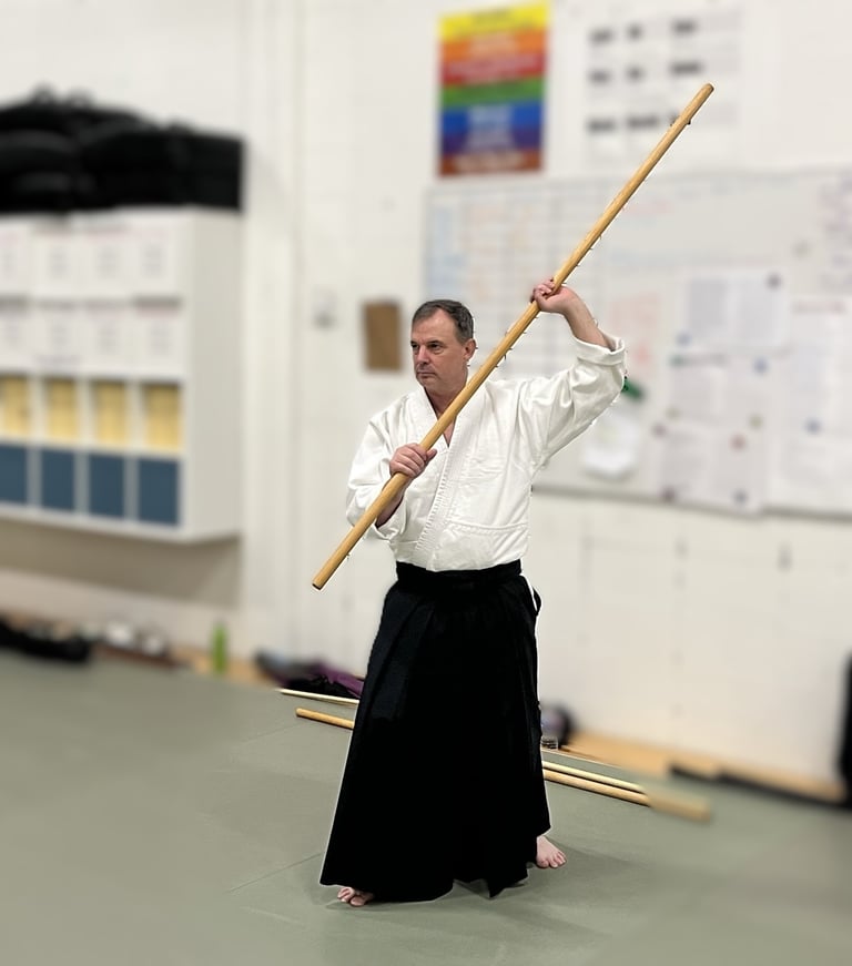 Mark practicing bojutsu