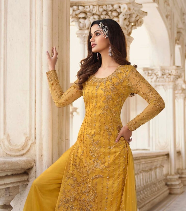 a woman in a yellow dress with a yellow dress