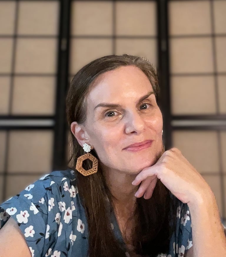 writer creator Amy A. DeCew office candid headshot