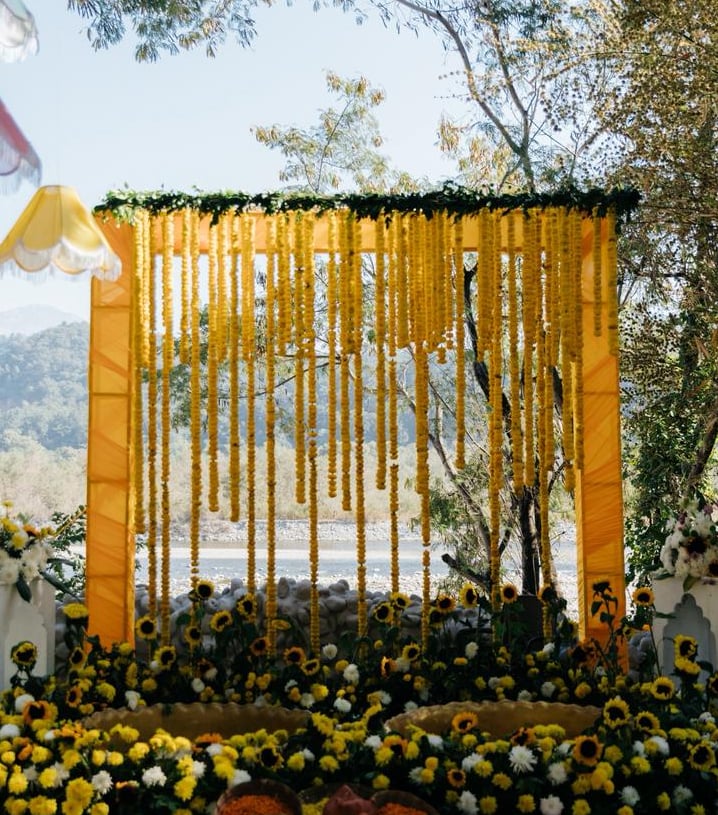 "Ring ceremony decoration with elegant backdrop and flowers"